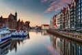 Gdansk, Poland - July 4, 2022: Beautiful architecture of the Main Town of Gdansk with the historic Crane over the Motlawa River at Royalty Free Stock Photo