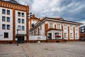 Facade of renovated aparthotel Hevelius Brewery with bakery and restaurant next to it on area where