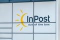 Logo and sign InPost on parcel locker Paczkomat in Poland