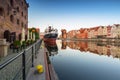 Gdansk, Poland - July 25, 2019: Old town of Gdansk wth Soldek ship at sunrise, Poland. Gdansk is the historical capital of Polish Royalty Free Stock Photo