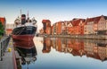 Gdansk, Poland - July 25, 2019: Old town of Gdansk wth Soldek ship at sunrise, Poland. Gdansk is the historical capital of Polish Royalty Free Stock Photo