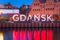 Gdansk, Poland - July 17, 2020: Sign of GdaÃâsk city at the old town over Motlawa river, Poland. Gdansk is the historical capital Royalty Free Stock Photo