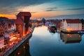 Gdansk, Poland - June 17, 2023: The Main Town of Gdansk with the historic port Crane over the Motlawa river at sunset, Poland Royalty Free Stock Photo