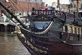 GDANSK, POLAND - JUNE 07, 2014: Wooden tourist ship stylized as a pirate boat with unknown people on the board