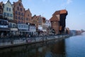 Gdansk Poland March 2022 beautiful old town over Motlawa river. The Zuraw Crane and colorful gothic facades of the old Royalty Free Stock Photo