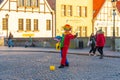 Gdansk, Poland - 11 March, 2022: A man in cloun form blows soap bubbles in Gdansk Royalty Free Stock Photo