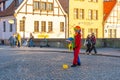 Gdansk, Poland - 11 March, 2022: A man in cloun form blows soap bubbles in Gdansk Royalty Free Stock Photo