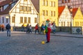 Gdansk, Poland - 11 March, 2022: A man in cloun form blows soap bubbles in Gdansk Royalty Free Stock Photo