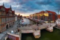 Gdansk, Poland - May 23, 2021: Amazing architecture of the main city in Gdansk at sunset, Poland. Aerial view of the Motlawa river