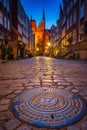 Gdansk, Poland - May 21, 2022: Beautiful architecture of Mariacka street in Gdansk at night, Poland