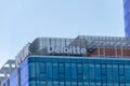 Logo and sign of Deloitte. Deloitte.
