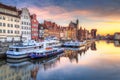 Old town of Gdansk reflected in the Motlawa river at sunrise, Poland. Royalty Free Stock Photo