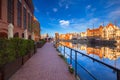 Old town of Gdansk reflected in the Motlawa river at sunrise, Poland Royalty Free Stock Photo