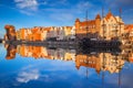 Gdansk, Poland - May 5, 2018: Old town of Gdansk reflected in the Motlawa river at sunrise, Poland. Gdansk is the historical Royalty Free Stock Photo