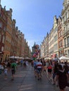 Gdansk, Poland: People walk at the Dlugi Targ street. Few tourists also visiting the historic Gdansk city center.