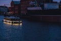 Gdansk Poland May 2022 Touristic restaurant ship sailing Old town in Gdansk. Cafe on water at night dusk evening Ship Royalty Free Stock Photo