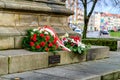 Flowers at the monument to Jan III Sobieski in the historic center of Gdansk The wood market Royalty Free Stock Photo