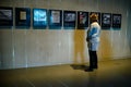 A woman in the museum examines the exposition dedicated to the Second World War
