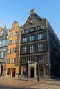 Old street with historic, buildings and different establishments in Gdansk, Poland