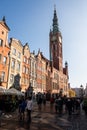 Historical town centre with typical colorful houses buildings, City Hall spire clock tower Hystorical museum, Gdansk, Poland Royalty Free Stock Photo