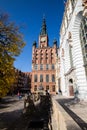 Historical town centre with typical colorful houses buildings, City Hall spire clock tower Hystorical museum, Gdansk, Poland Royalty Free Stock Photo