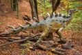 Realistic dinosaur model in the forest