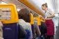 Gdansk Poland Paris France 12 19 2019 Flight. Stewardess and passengers in airplane cabin airline Raynair lowcost.Stock photo