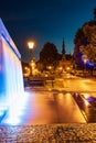 Beautiful Hevelius fountain highlighted by colorful lights around and splashing water around at Royalty Free Stock Photo