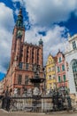 GDANSK, POLAND - SEPTEMBER 2, 2016: Neptune`s fountain and the Town hall in Gdansk, Pola Royalty Free Stock Photo