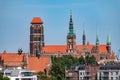 Gdansk, Pomerania / Poland - July 19, 2019: Buildings in the city center of Gdansk seen from a distance. Towers and roofs of the Royalty Free Stock Photo