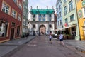 Gdansk, pomorskie / Poland - August, 8, 2020: Golden Gate in the Old Town of Gdansk. Historic tenement houses in the city of