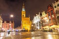 Gdansk Town Hall and the Fountain of Neptune in Long market, evening view Royalty Free Stock Photo