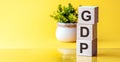 GDP - Gross Domestic Product - cube wooden block with alphabet combine abbreviation GDP Royalty Free Stock Photo