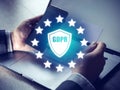 GDPR Concept, Businesspeople hand holding digital smartphone sign general data protection regulation and key icon, Cyber security Royalty Free Stock Photo
