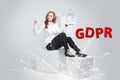 GDPR, concept image. General Data Protection Regulation, the protection of personal data. Young woman working with Royalty Free Stock Photo