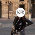 GDPR - street portrait of a young woman, face covered with the inscription General Data Protection Regulation. Cyber security and Royalty Free Stock Photo