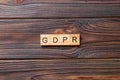 GDPR word written on wood block. general data protection regulation text on cement table for your desing, concept Royalty Free Stock Photo