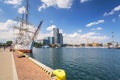 Gdynia, Poland - June 8, 2019: Polish frigate Dar Pomorza at the Baltic Sea with Sea Towers skyscraper in Gdynia Royalty Free Stock Photo