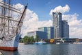 Gdynia, Poland - June 8, 2019: Polish frigate Dar Pomorza at the Baltic Sea with Sea Towers skyscraper in Gdynia Royalty Free Stock Photo