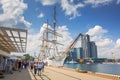 Gdynia, Poland - June 8, 2019: Polish frigate Dar Pomorza at the Baltic Sea with Sea Towers skyscraper in Gdynia Royalty Free Stock Photo