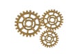 Gear and cogs wheels isolated on a white background, clock mechanism, brass metal engine industrial Royalty Free Stock Photo