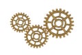 Gear and cogs wheels isolated on a white background, clock mechanism, brass metal engine industrial Royalty Free Stock Photo