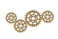 Gear and cogs wheels isolated on a white background, clock mechanism, brass metal engine industrial Royalty Free Stock Photo