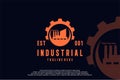 gear logo with industrial buildings concept