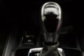 Gear shift handle in a modern car, closeup photo Royalty Free Stock Photo