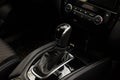 Gear shift handle in a modern car, closeup photo Royalty Free Stock Photo