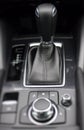 Gear shift knob in leather car interior detailed Royalty Free Stock Photo
