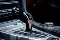 Gear shift in the middle console of a modern car Royalty Free Stock Photo