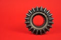 Gear wheel on the red background. Royalty Free Stock Photo