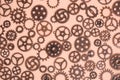 Gears, beige abstract background, lots of small gears, steampunk Royalty Free Stock Photo